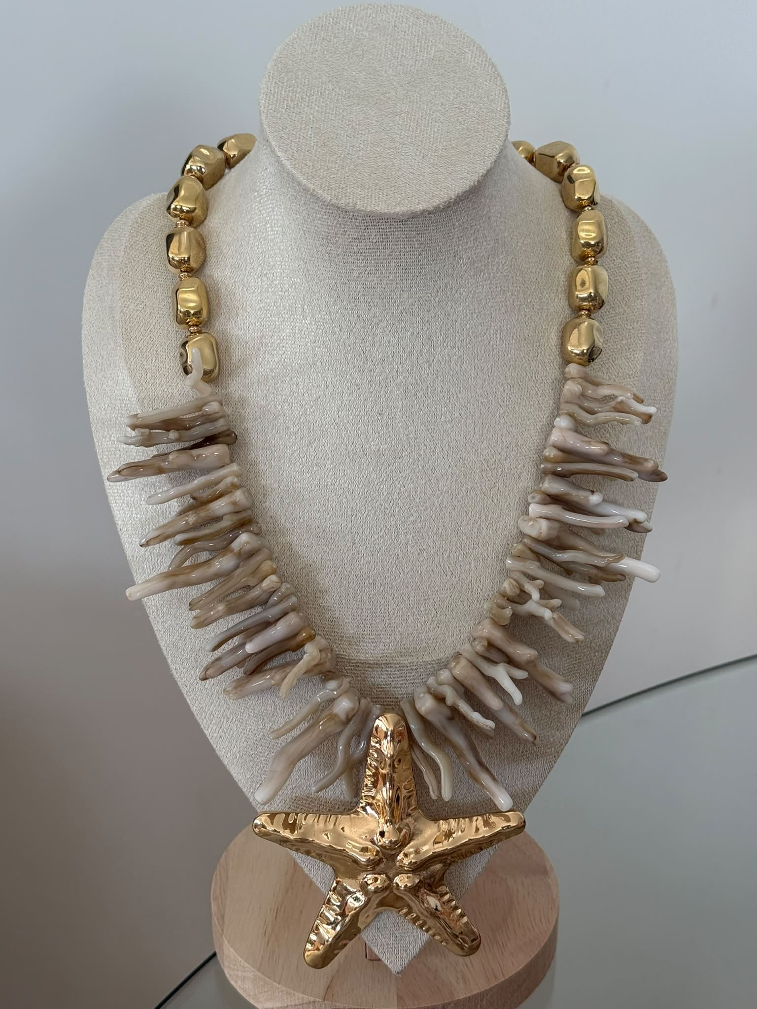 Collar estrella dorada